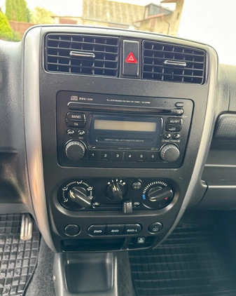 Suzuki Jimny cena 33900 przebieg: 166000, rok produkcji 2011 z Radomsko małe 497